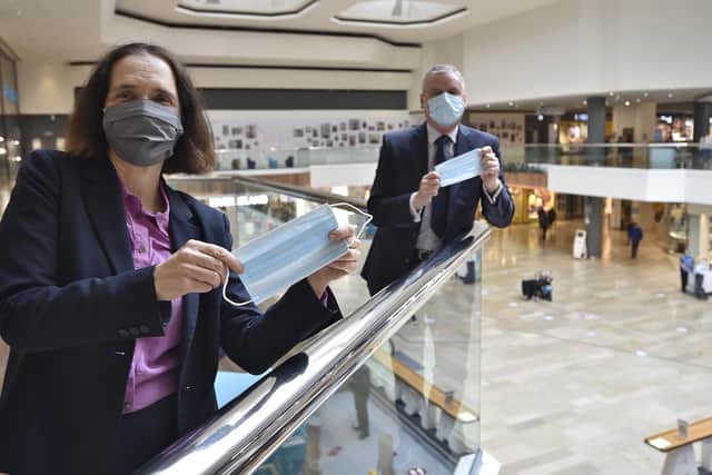 Dr Liz Robin, Cambs and Peterborough CC  Director of Public Health with Mark Broadhead, Queensgate Centre director at the launch of a face covering awareness campaign in the centre.