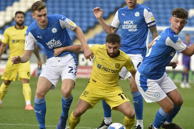 Action from Posh v Burton in the EFL Trophy.