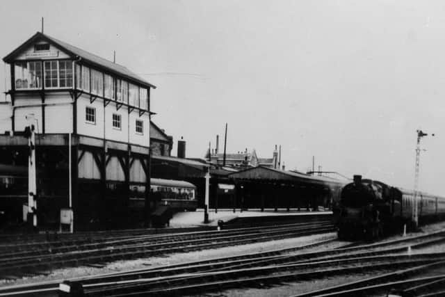 Steam hauled passenger trains... Can you help us date this picture?