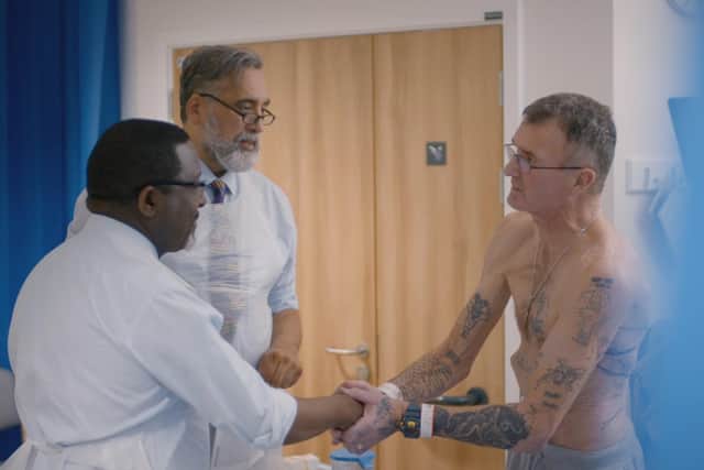 Kevin Ireson thanks Professor Charles Malata and Aman Coonar after his operation. Photo credit: BBC/Dragonfly