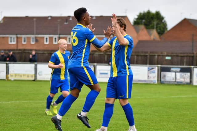 Dion Sembie-Ferris celebrates the third goal for Peterborough Sports against Stansted. Photo: James Richardson.