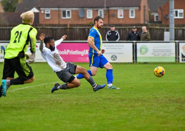 Josh Moreman completes his hat-trick for Peterborough Sports against Stansted. Photo: James Richardson.