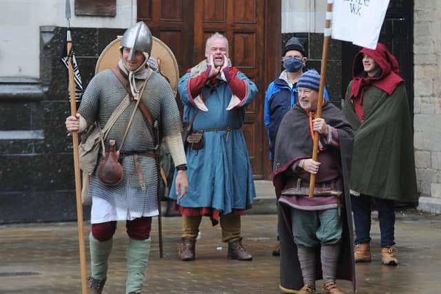 Lewis Kirkbride, dressed as one of King Harold's warriors on his 1066 Battle Walk for Man Health, passing through Peterborough. He was met by local Anglo-Saxon re-inactors.