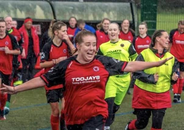 Netherton United's player of the match Amber Parkinson celebrates an amazing FA Cup win. Photo: Stattoo Ltd.