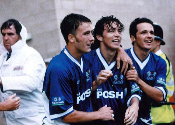 Simon Davies (centre) celebrates his winning goal at Northampton in 1999 with Adam Drury (left) and Matthew Etherington.