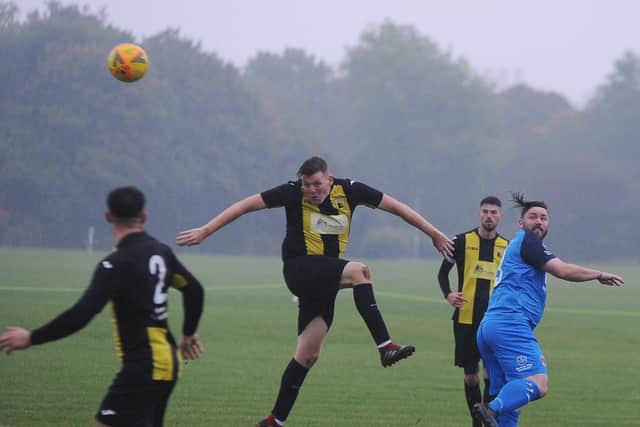 Action From Crowland Town's 3-1 win at ICA Sports (blue) in the Peterborough Premier Division. Photo: David Lowndes.
