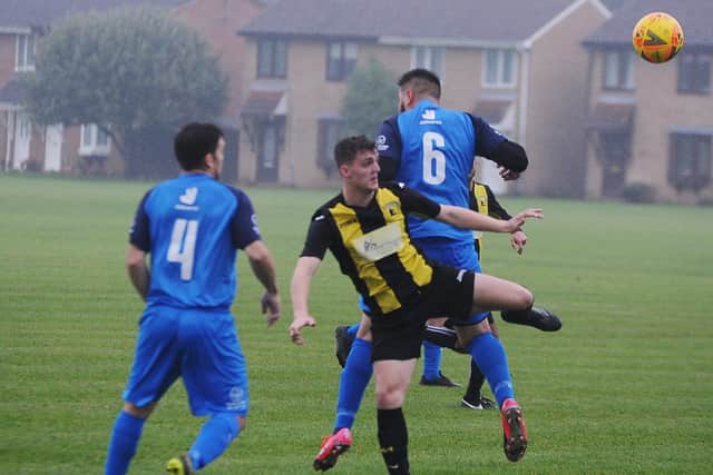 Action from Crowland Town's 3-1 win at ICA Sports (blue) in the Peterborough Premier Division. Photo: David Lowndes.