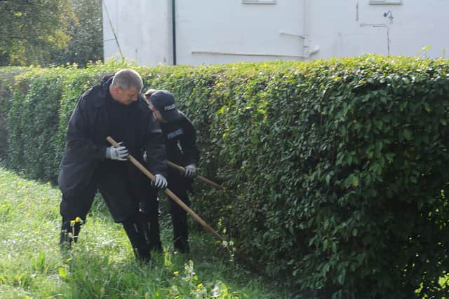 Police searching area around Newborough Road near the A47 EMN-200610-133830009