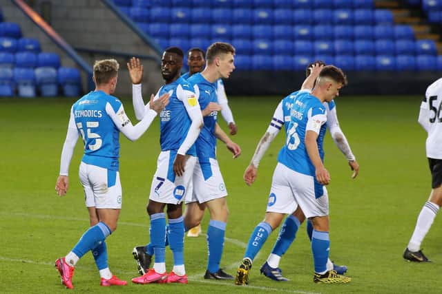 Posh celebrate Mo Eisa's first-half goal against Fulham.