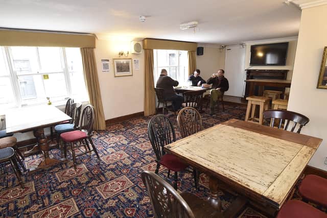 Socially distanced interiors of  the Falcon Hotel