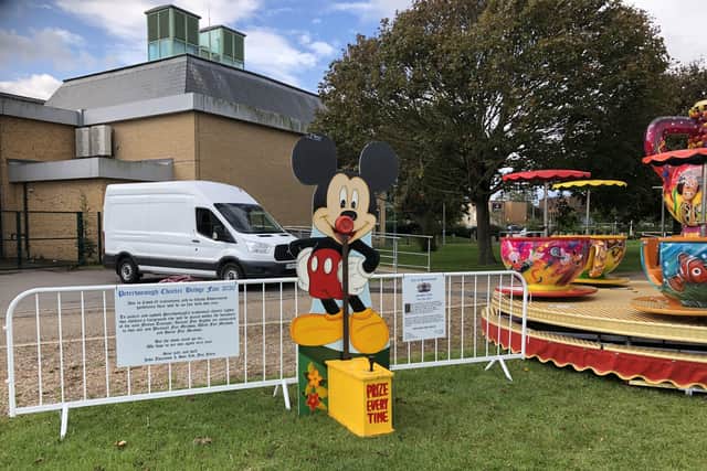 A Mickey Mouse high striker, one of two attractions at the token Bridge Fair.