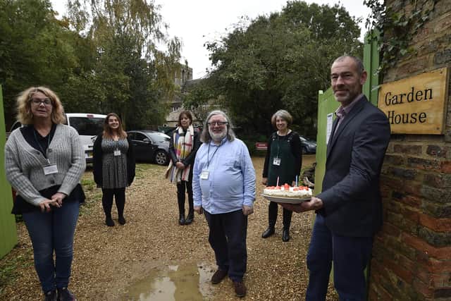 Steven Pettican (right) and some of the team at the Garden House celebrate their second anniversary. EMN-200810-172900009