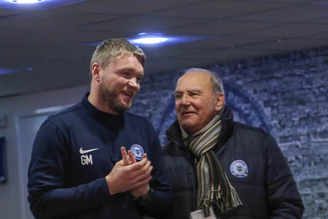 Tommy Robson with former Posh player and manager Grant McCann.