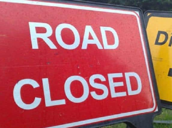 Road closed sign