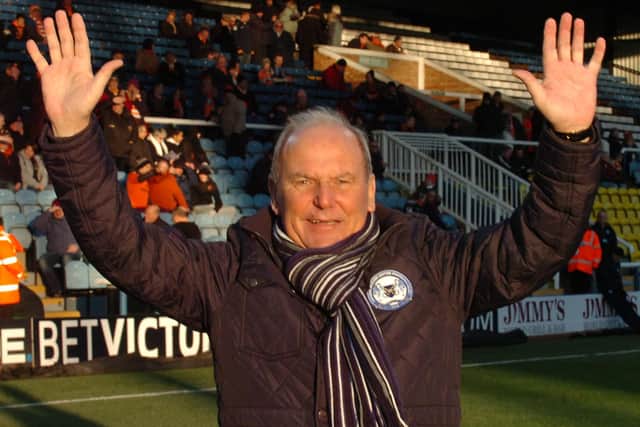 Tommy Robson waves to fans at London Road
