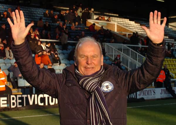 Tommy Robson waves to fans at London Road