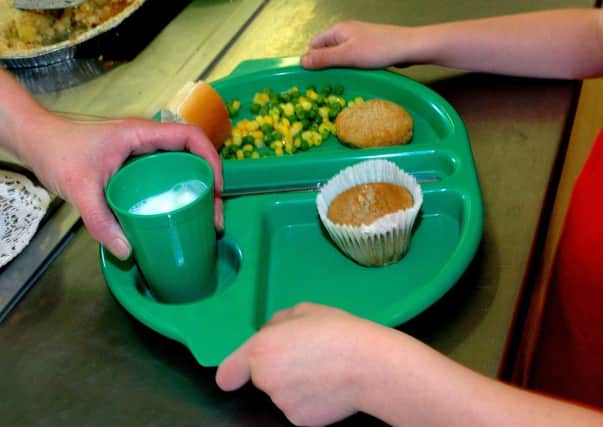 There is a call for the free school meal scheme to be widened. Photo: PA EMN-201016-083458001