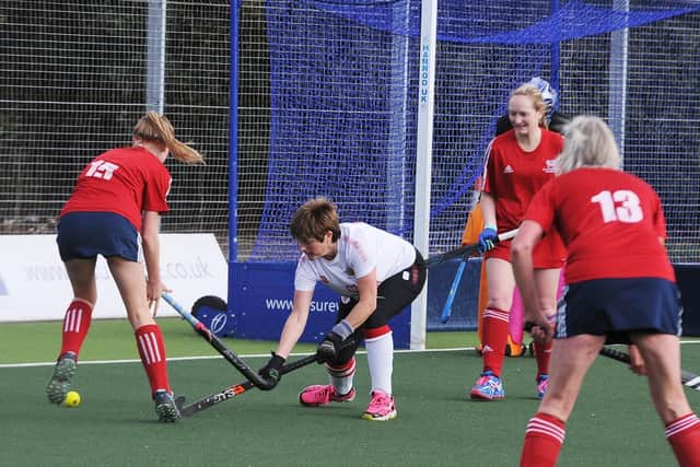 Action from City of Peterborough thirds' (red) 3-0 win over Wisbech 3rds. Photo: David Lowndes.