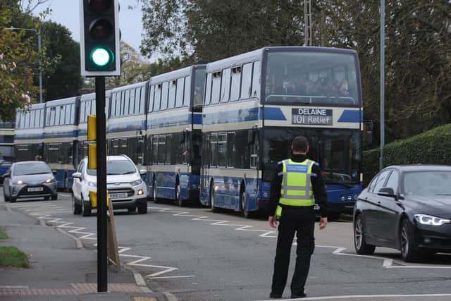 A fleet of Delaine Buses evacuate Bourne Grammar School pupils