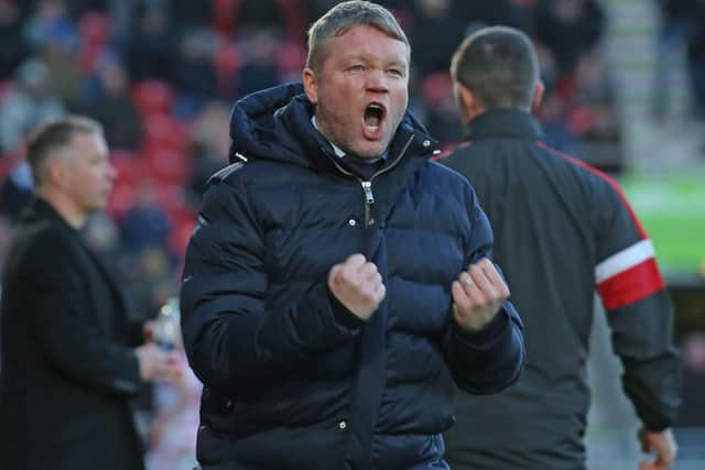 Grant McCann celebrates a controversial Doncaster win over Posh in February, 2019.