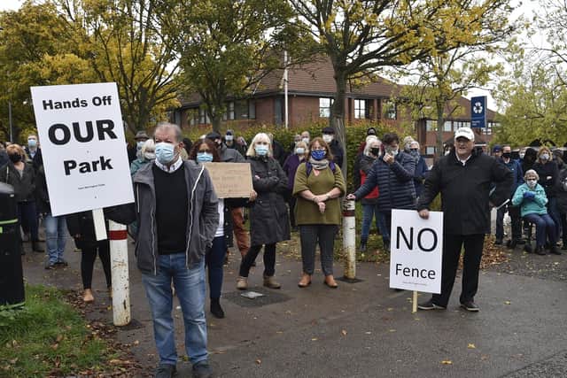 Werrington residents protest against a fence being erected around the playing fields behind Ken Stimpson School in October.