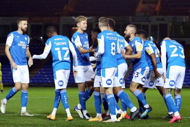 Posh celebrate a goal for Jonson Clarke-Harris against Burton. Photo: Joe Dent/theposh.com.