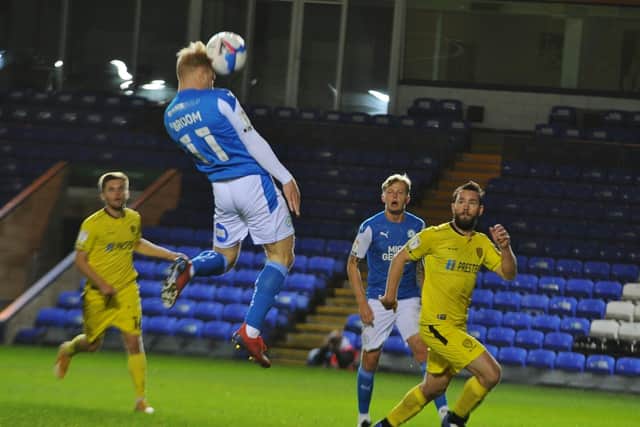 Posh substitute Ryan Broom couldn't get this header on target against Burton. Photo: David Lowndes.