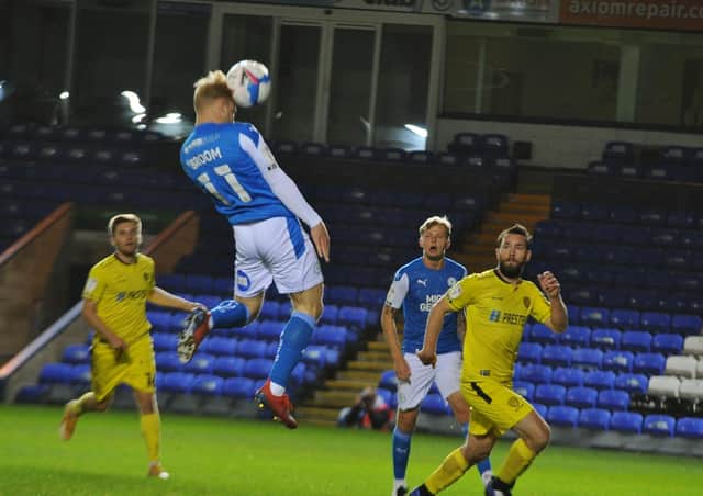 Posh substitute Ryan Broom couldn't get this header on target against Burton. Photo: David Lowndes.