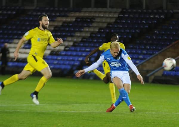 Ryan Broom misses a great chance for Posh towards the end of the game against Burton. Photo: David Lowndes.