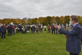 MP for Peterborough Paul Bristow talking to protesters on the playing fields in October this year.