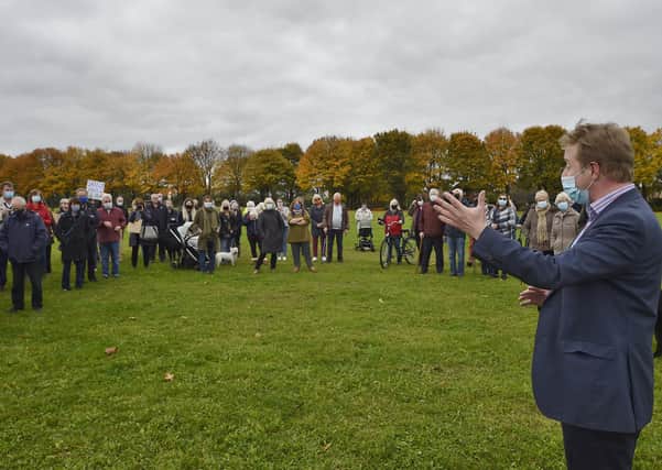 MP for Peterborough Paul Bristow talking to protesters on the playing fields in October this year.