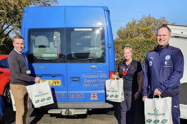 Posh Foundation Community Manager, Gavin Slater (right) delivering food parcels during October half term