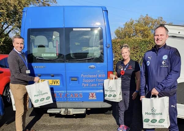 Posh Foundation Community Manager, Gavin Slater (right) delivering food parcels during October half term