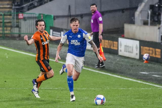 Frankie Kent in action with George Honeyman of Hull City last weekend. Photo: Joe Dent/theposh.com.
