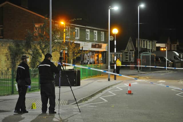 Police officers at Bluebell Avenue junction with Welland Road, Dogsthorpe.