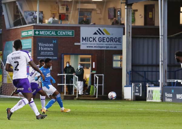 Siriki Dembele of Peterborough United scores his second goal of the game against Shrewsbury Town. Photo: Joe Dent/theposh.com.