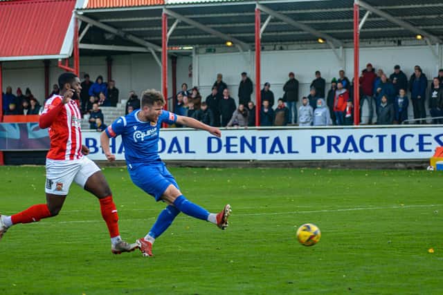 Tom Siddons fires Stamford AFC into an early lead in their FA Trophy tie at Stourbridge. Photo: Dan Allen.