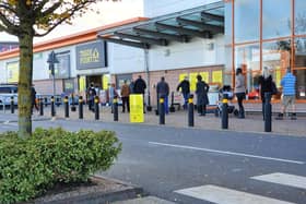 Customers waiting in line at B&Q on Maskew Aveneue