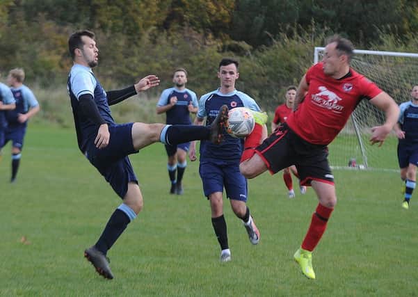 Stilton United (red) and Netherton United in action recently.