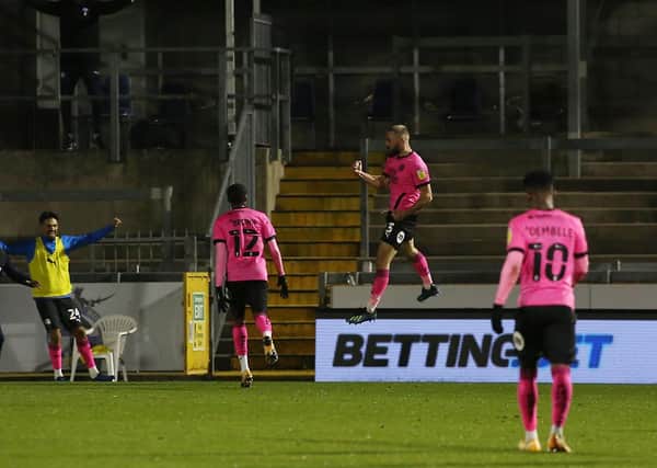 Dan Butler jumps for joy after scoring at Bristol Rovers. Photo: Joe Dent/theposh.com.
