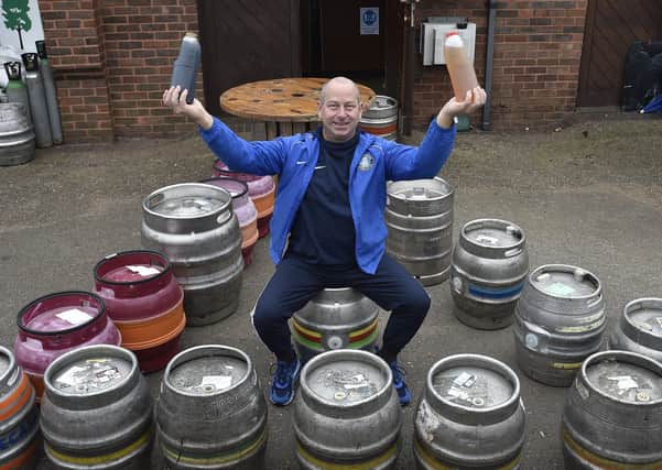 Andy Simmonds , at The Ploughman pub, Werrington selling takeaway beer. during the first lockdown