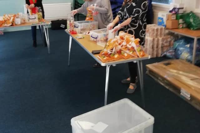 Halloween packing at Family Voice Peterborough by Helen, Judita and Pauline