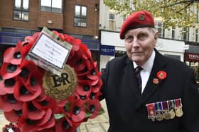 Mike Seabourne MBE laying a wreath on behalf of the  Fenland branch of the  Royal Military Police Association at  the Peterborough Remembrance Sunday service at the War memorial at Bridge Street. Pictures: David Lowndes