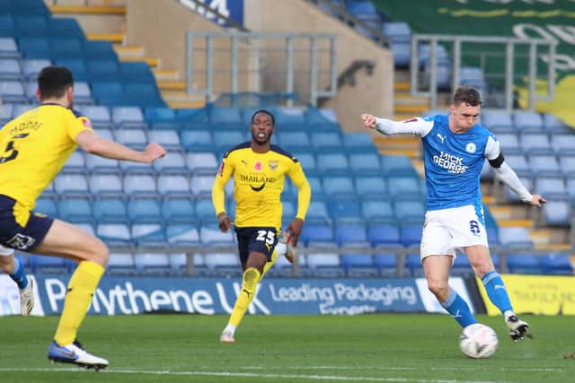 Posh midfielder Jack Taylor in action.