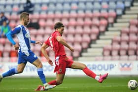 Harry Cardwell of Chorley scores his side's second goal during the FA Cup first round match at Wigan. (Photo by Alex Livesey/Getty Images).
