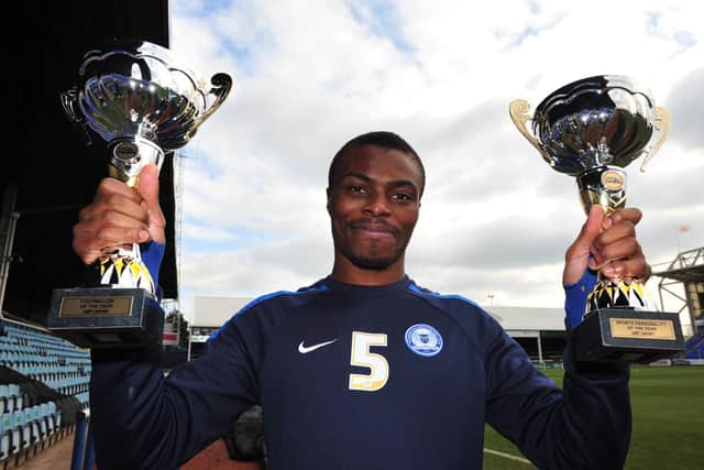 Gaby Zakuani with his PT Sports Personality of the Year and Footballer of the Year trophies from 2012.