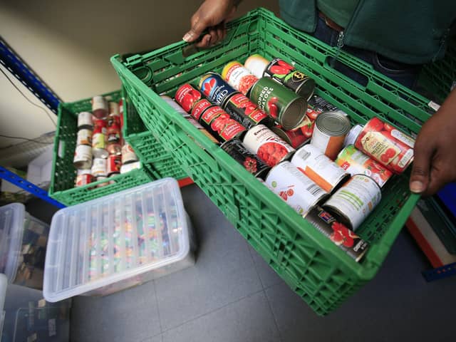Dozens of emergency food parcels were handed out to children in Peterborough every week during the first six months of the pandemic. Photo: PA EMN-201211-102309001