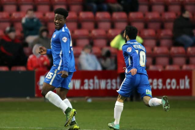 Jermaine Anderson (left) celebrates a goal for Posh at Crewe in 2015. Photo: Joe Dent/theposh.com.