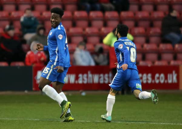 Jermaine Anderson (left) celebrates a goal for Posh at Crewe in 2015. Photo: Joe Dent/theposh.com.