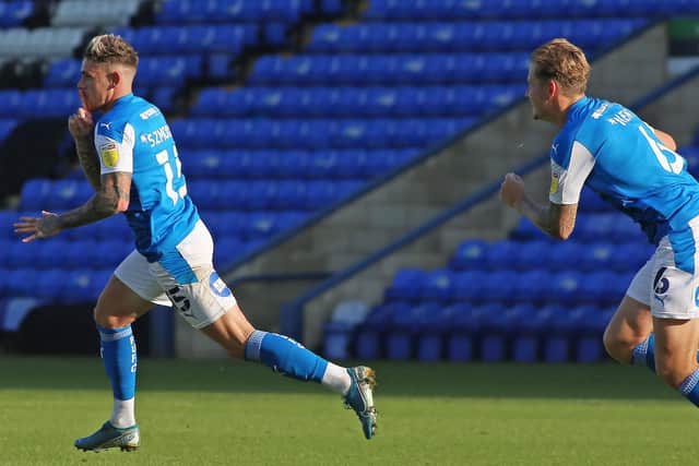 Sammie Szmodics (left) celebrates his last-gasp winning goal for Posh against Fleetwood. Photo: Joe Dent/theposh.com.